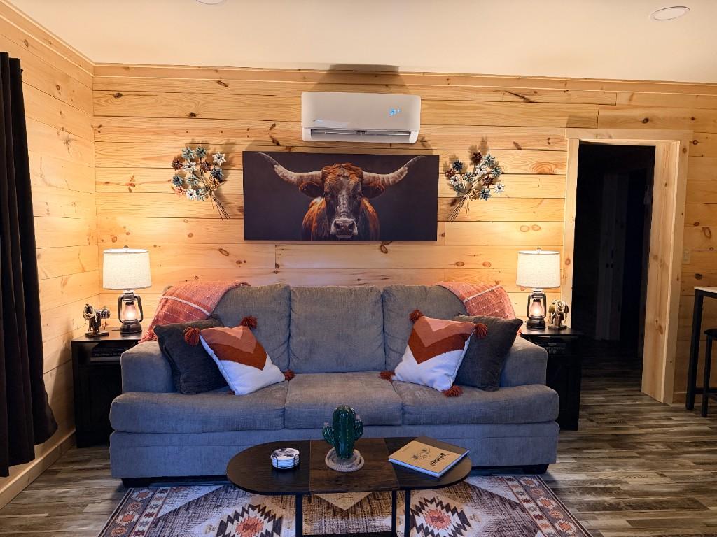 Blue Ridge Haven living room with sofa and longhorn wall art