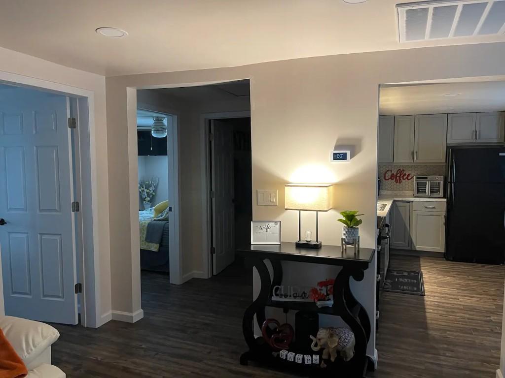 Fiddlers Roost bedroom corner with desk, chair, and king bed