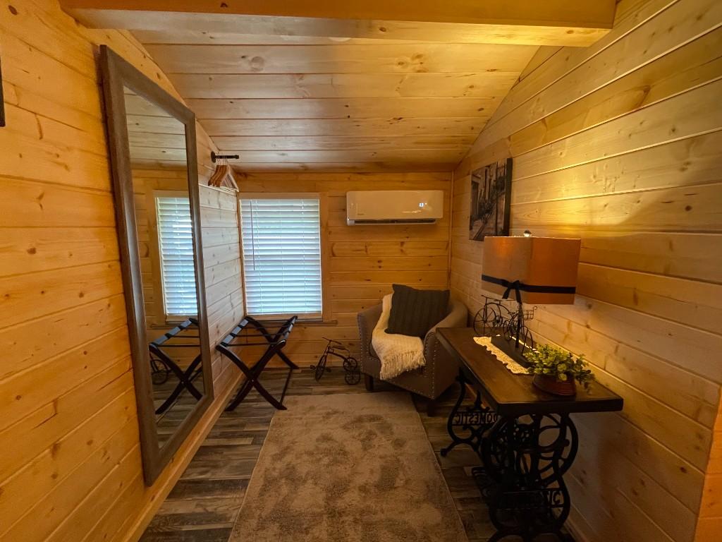 New River Hideaway nook with mirror, armchair, and console