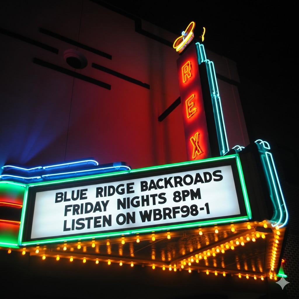 Rex Theater neon marquee at night